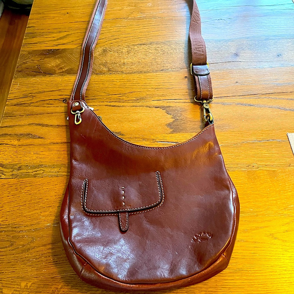 # 28-Katana Paris Brown vintage cross body handbag. In very good condition.